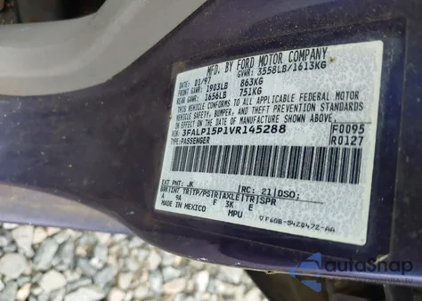 1997 Ford Escort Lx z USA, uszkodzony, nr VIN 3FALP15P1VR145288